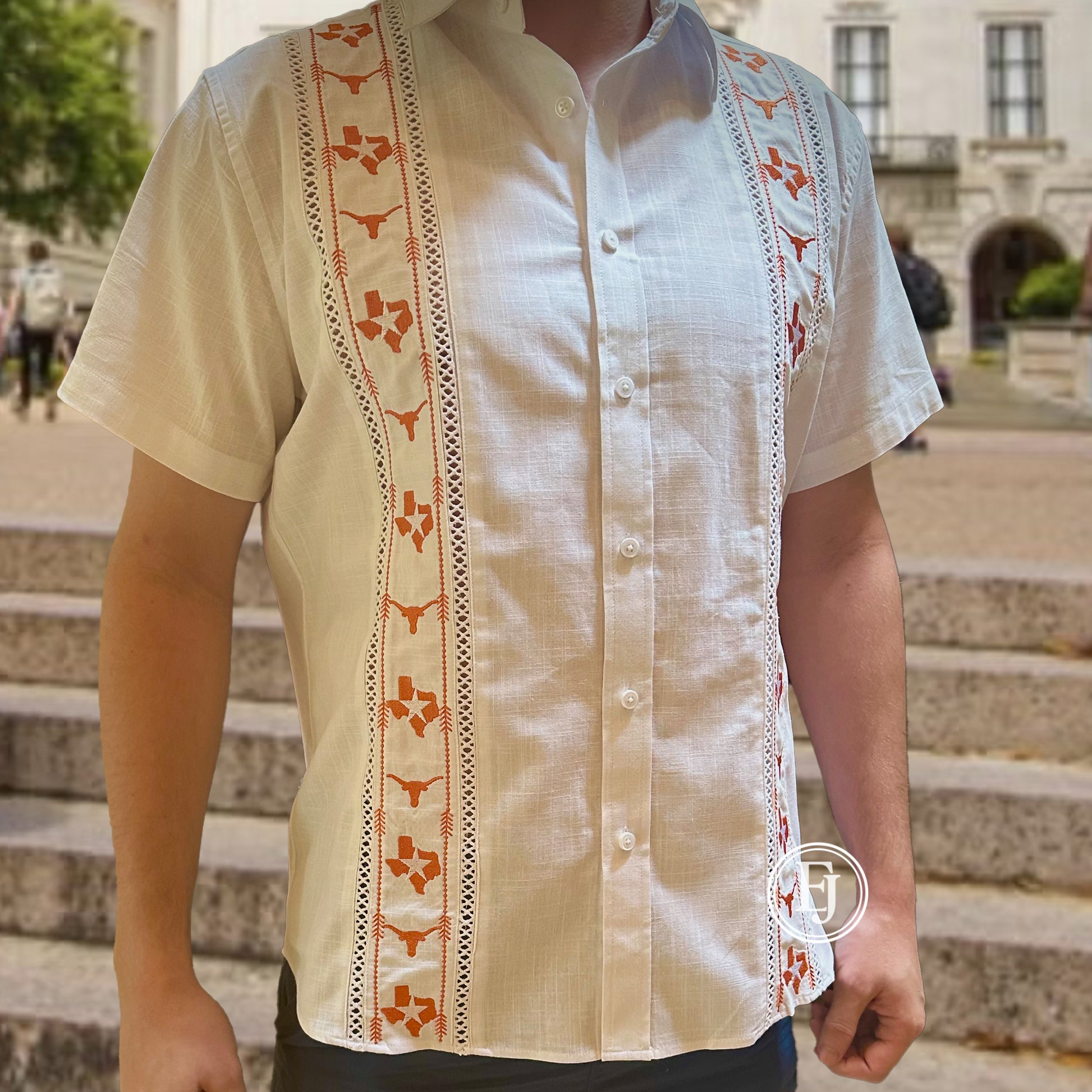 "Official University of Texas embroidered Longhorn logo detail on white guayabera"