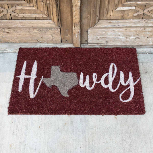 Howdy State doormat in maroon and gray with Texas shape
