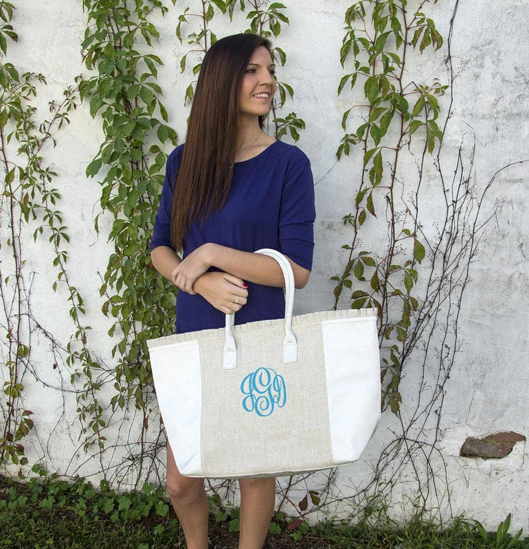 Lifestyle view of black weekender tote over arm