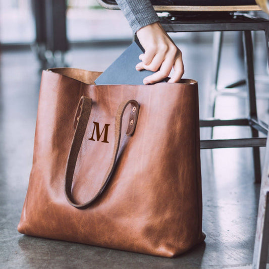 Side profile of The Harper full-grain leather tote in tan