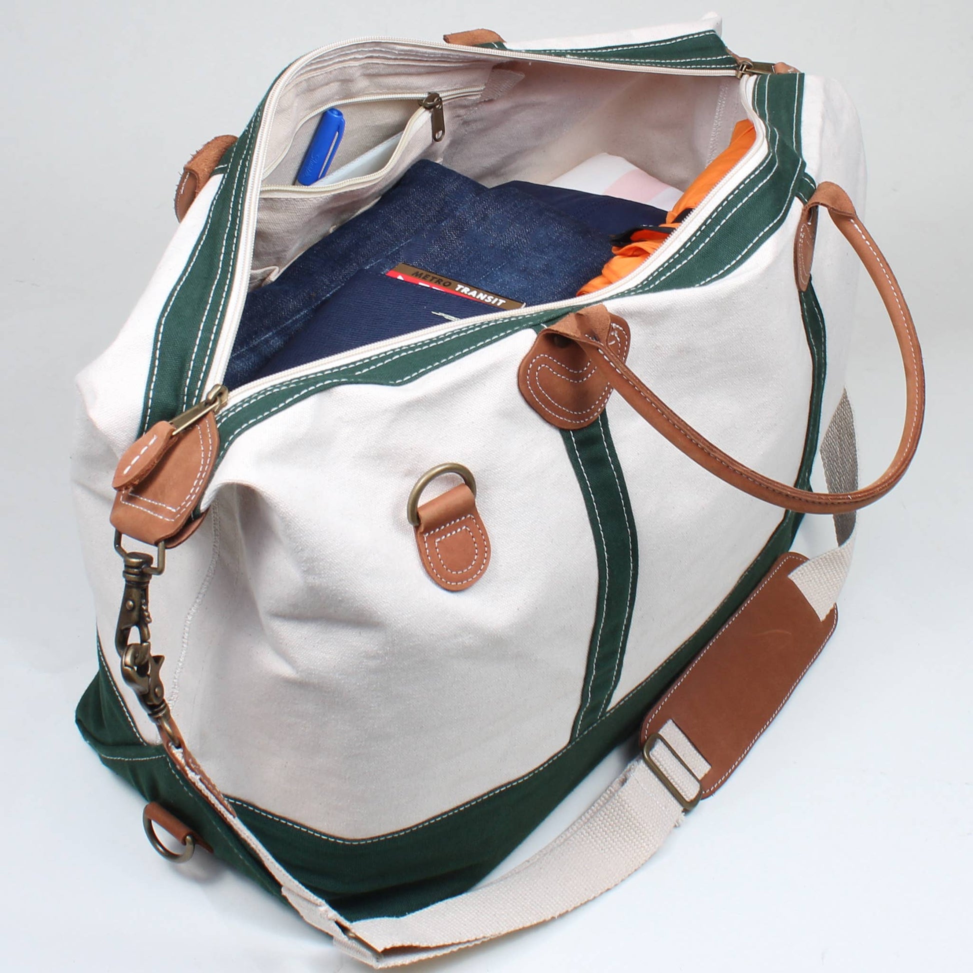 Interior of canvas travel duffel showing zip pocket